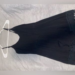 women's black mini romper. Size M